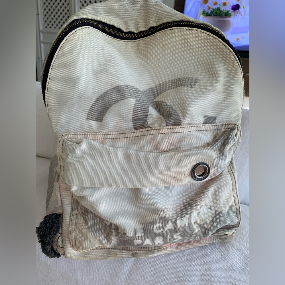 Stylish Denim Beige Backpack with Silver Zipper